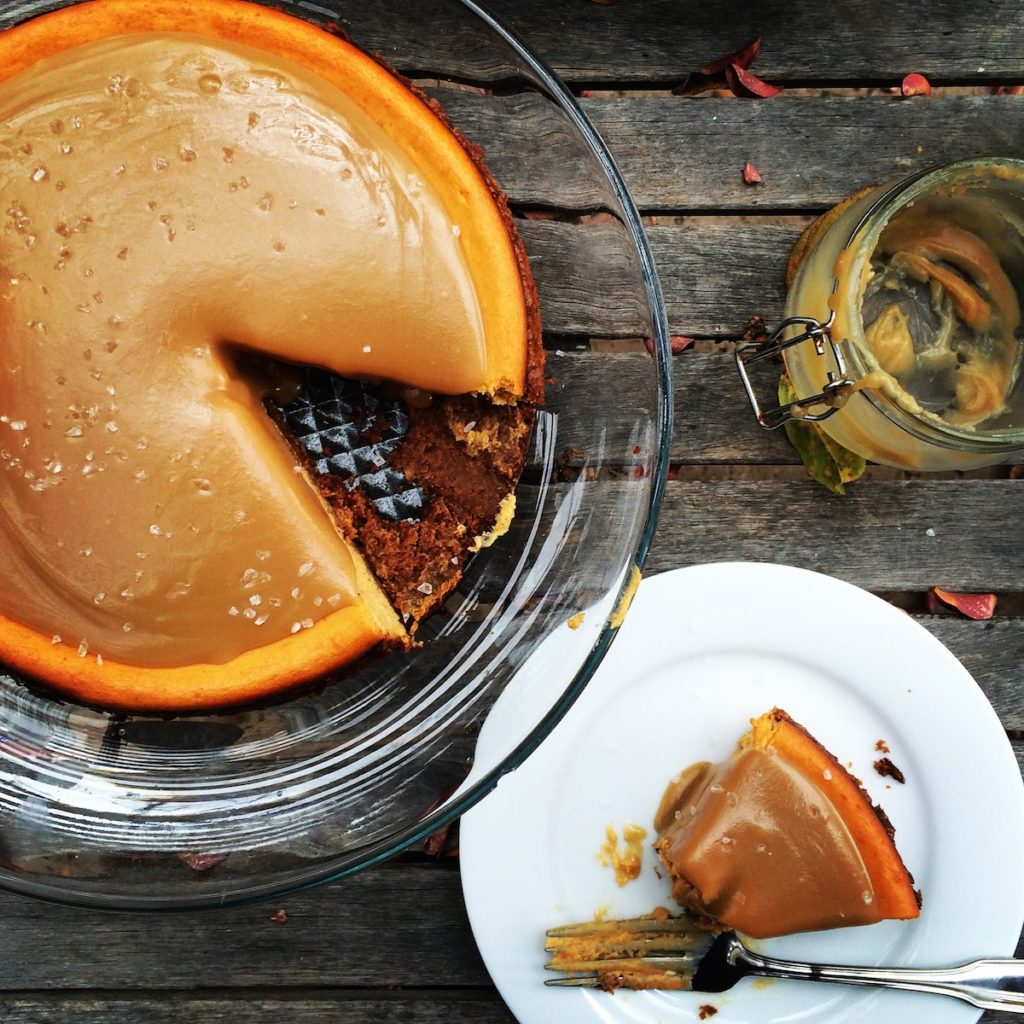 Salted Caramel Pumpkin Cheesecake with a  bite out of it.