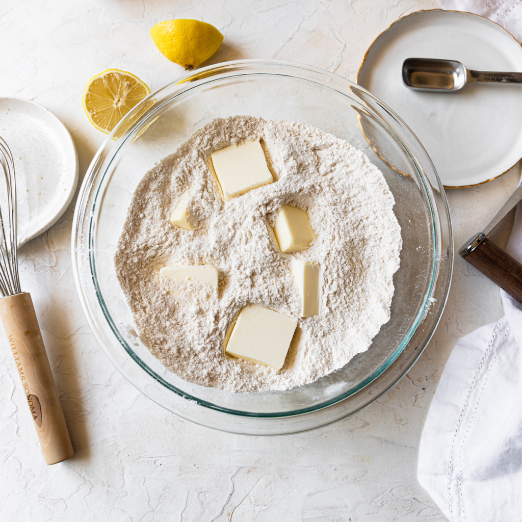 Flour and butter in a bowl.