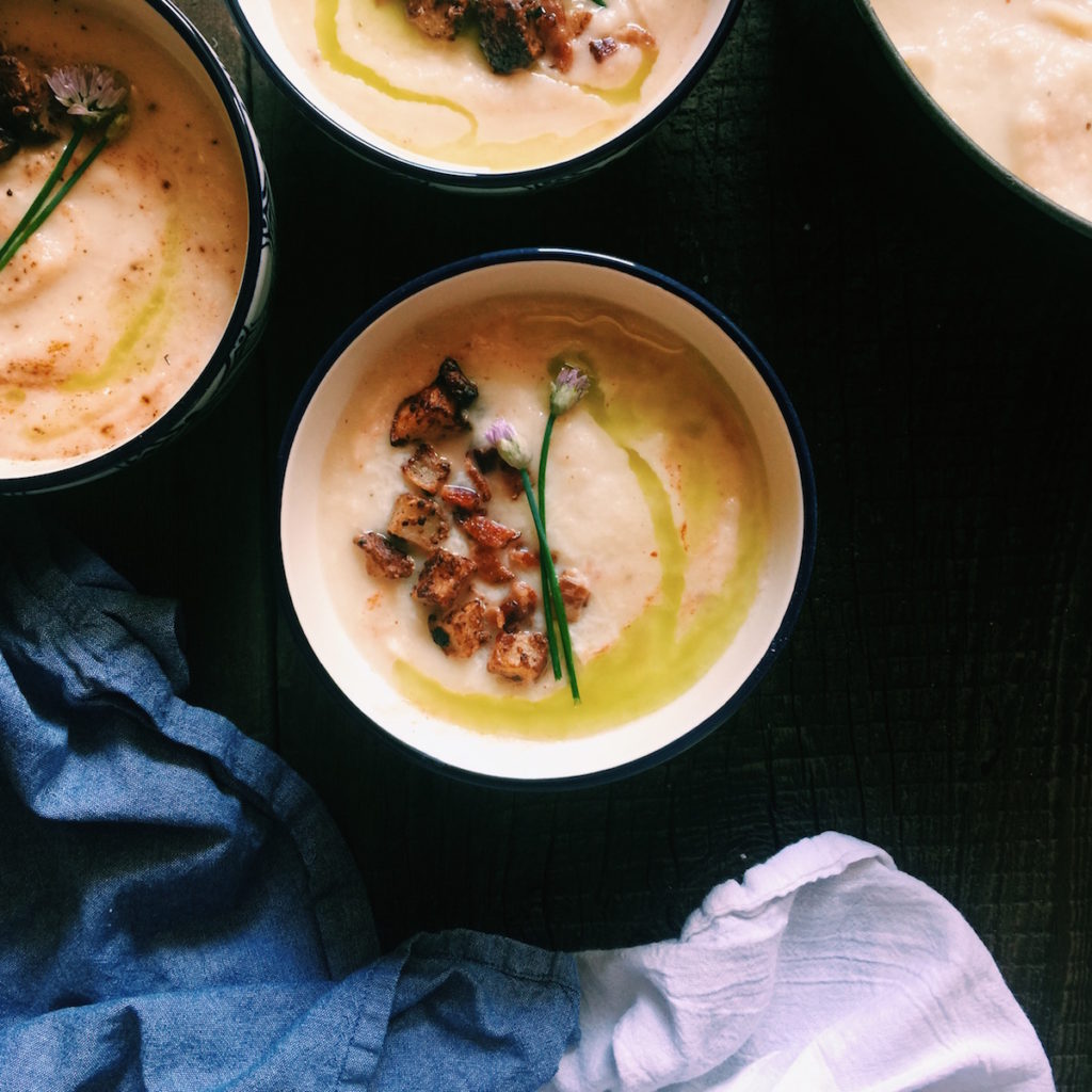 cauliflower soup with crispy pancetta, mustard-potato croutons + chive oil | Recipe via DisplacedHousewife | dairy-free and vegetarian options