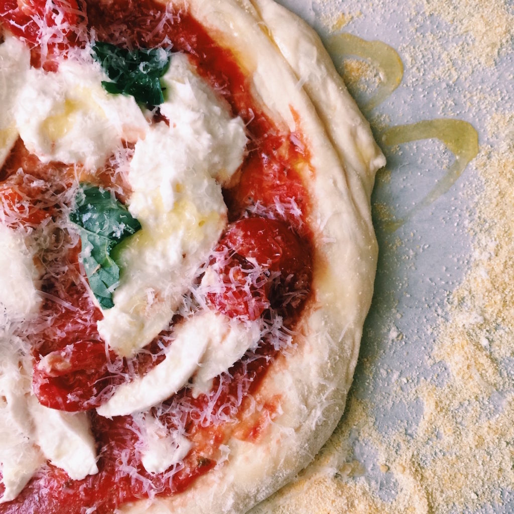 Easiest Pizza Dough Ever | recipe via DisplacedHousewife | No kneading! Mix ingredients, refrigerate for three days, bring to room temp and bake for 15 min @ 500F. Easiest. Pizza. Ever.
