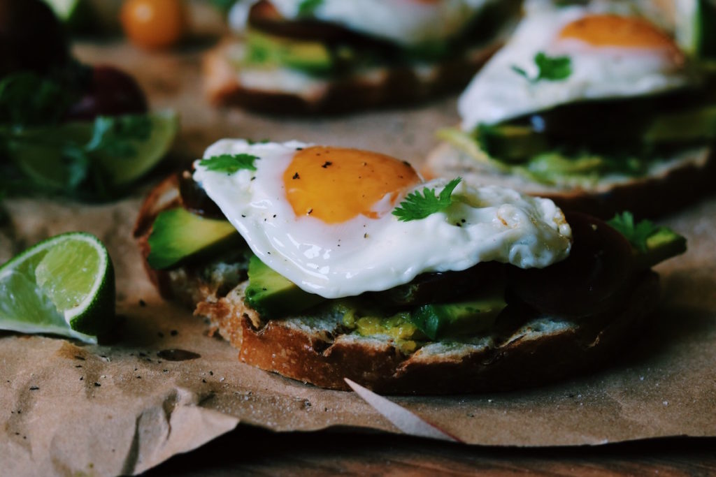 spanish-fried egg, smashed avocado + heirloom tomato toast | Recipe via DisplacedHousewife