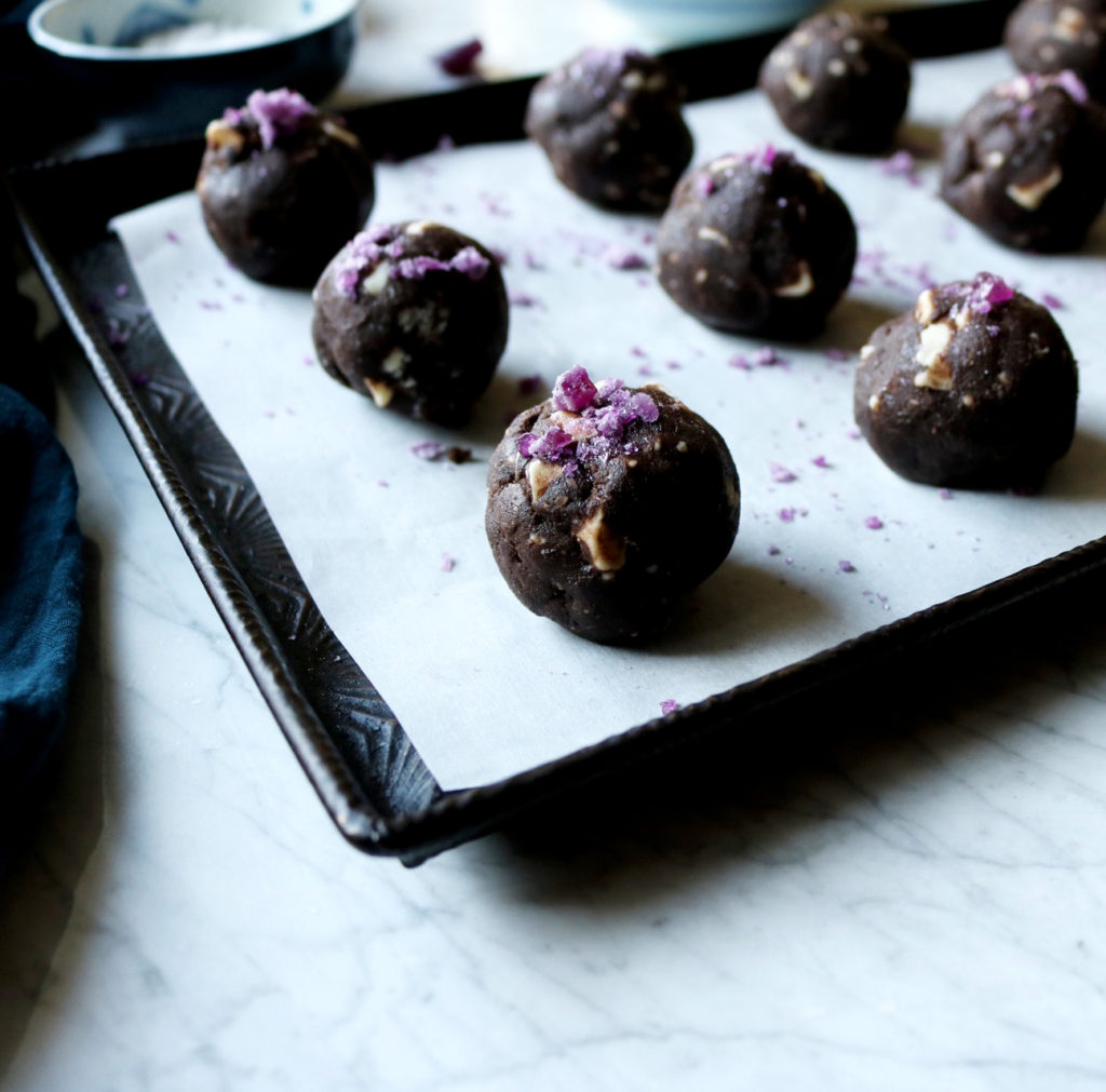 Dark Chocolate Violet Cookies | Recipe via DisplacedHousewife | A super dark chocolate dough is studded with ribbons of dark chocolate and crushed french violet hard candies.