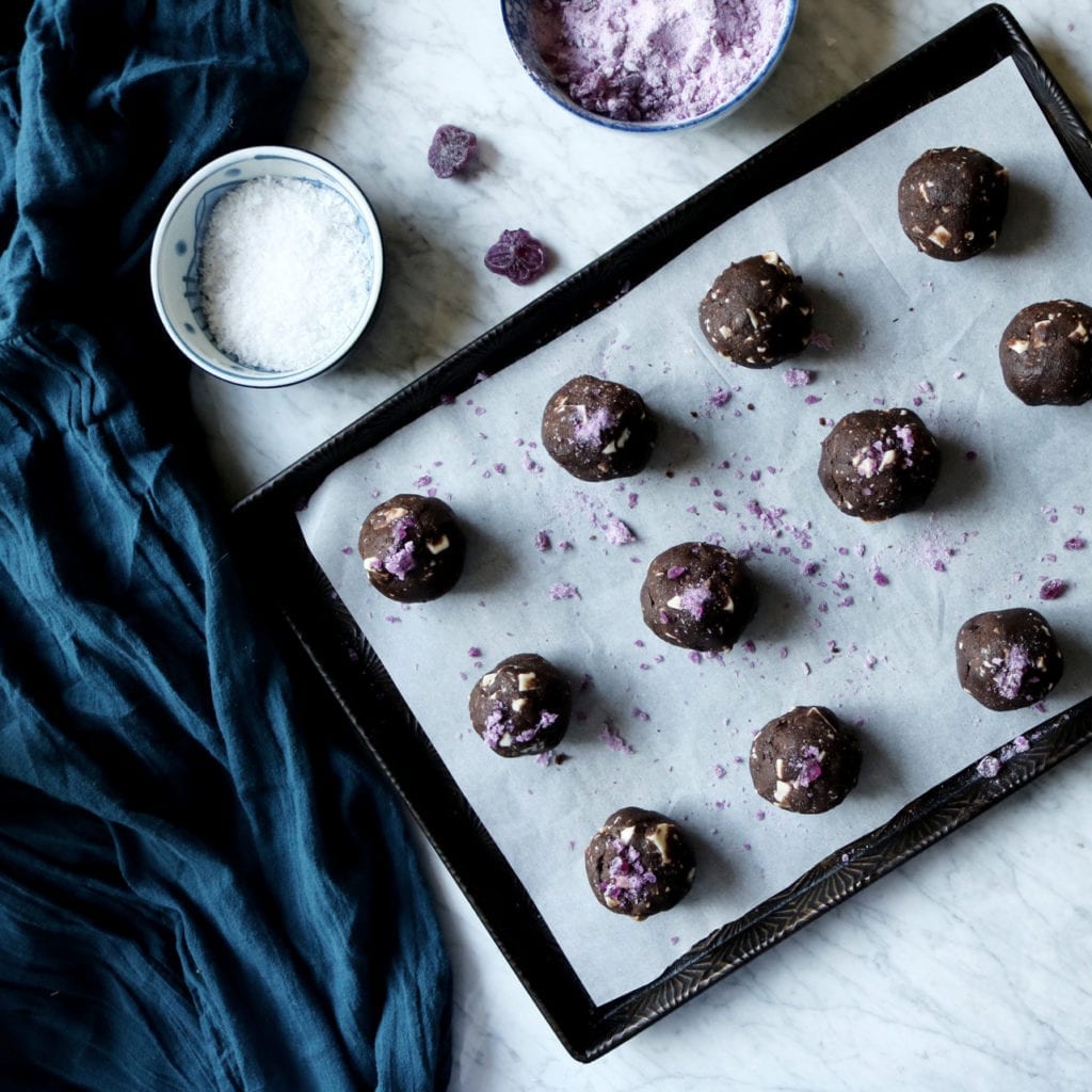 Dark Chocolate Violet Cookies | Recipe via DisplacedHousewife | A super dark chocolate dough is studded with ribbons of dark chocolate and crushed french violet hard candies.