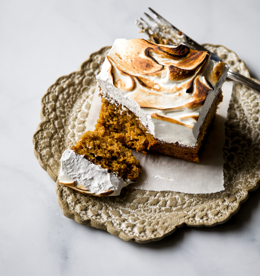 A slice of caramel pumpkin bars with toasted meringue.