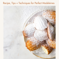 Madeleines dusted in confectioners' sugar
