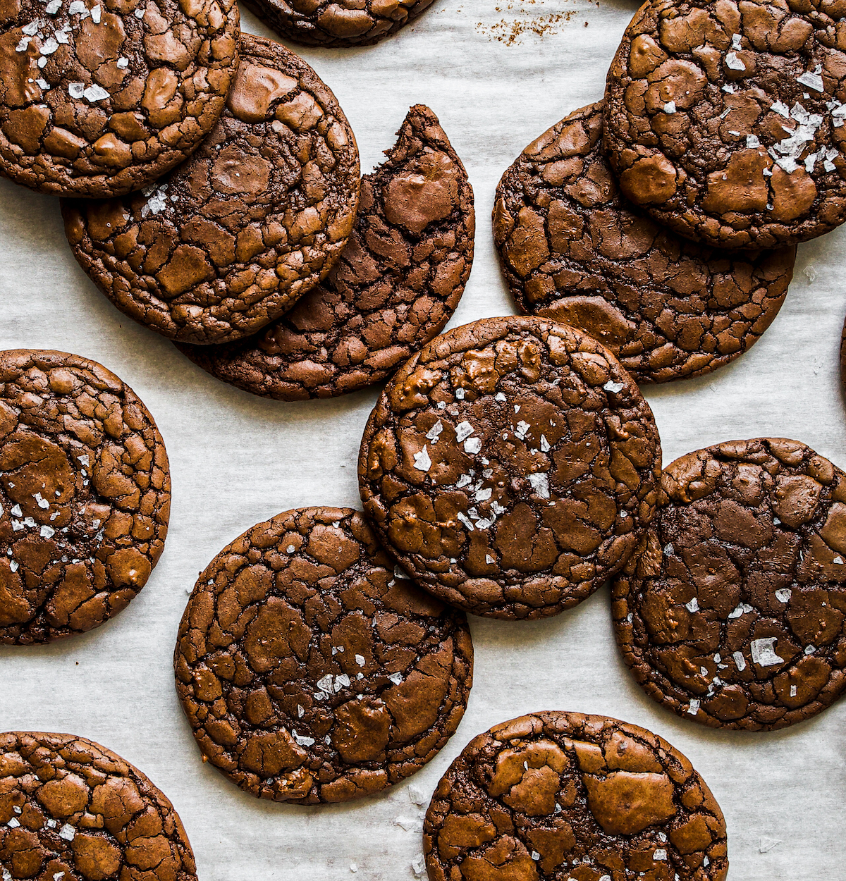 close up of brownie cookies with a dusting of sea salt flakes 