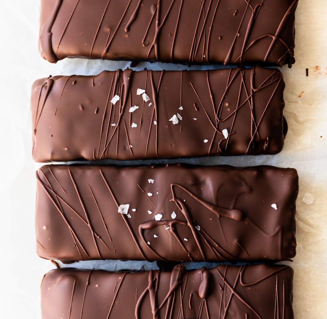 A close up photo of chocolate bars on a white background