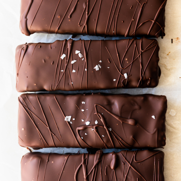 A close up photo of chocolate bars on a white background