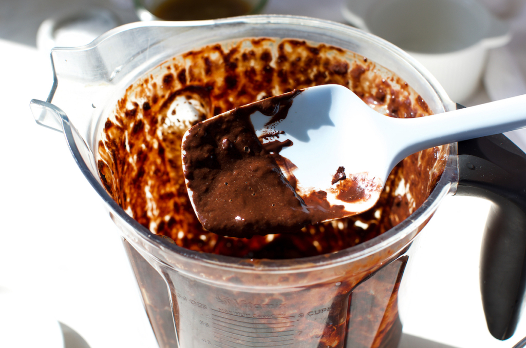 A close  up shot of a smooth chocolate mixture.