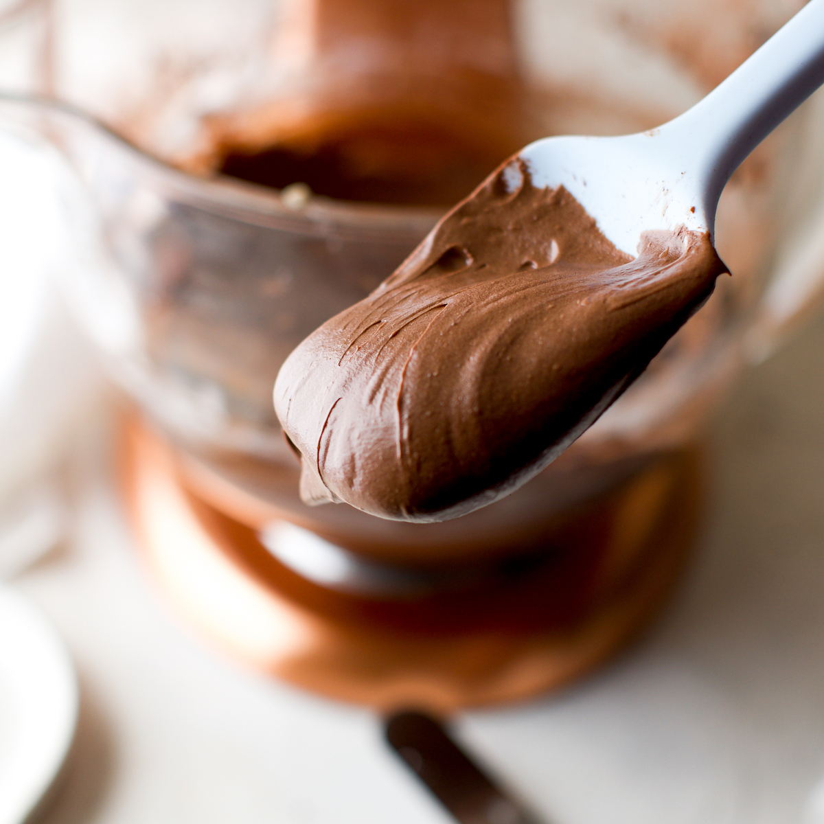 Chocolate malt buttercream on a spoonula.