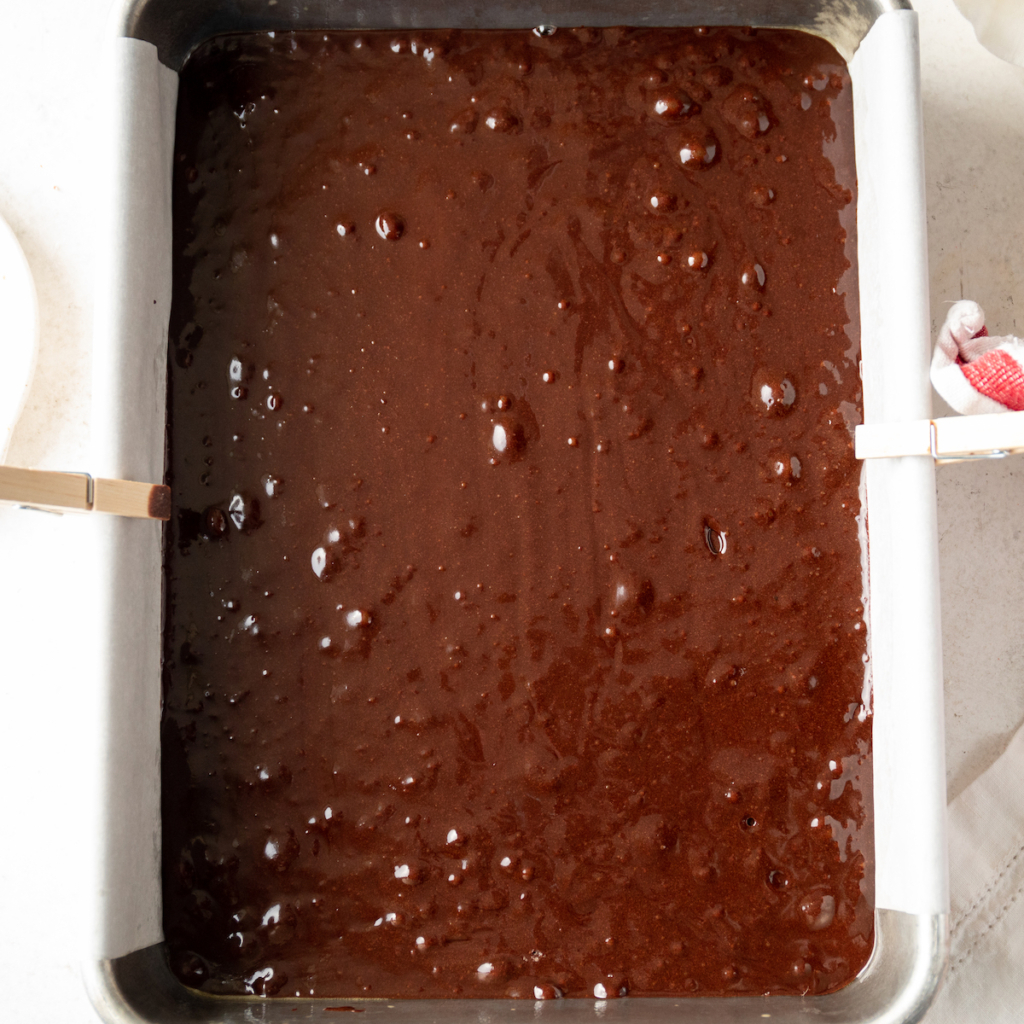 Brownies in a pan before baking.