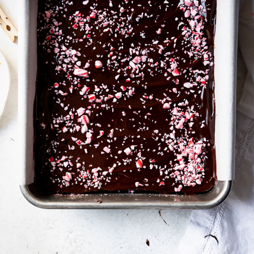 Crushed peppermint candies over brownies.