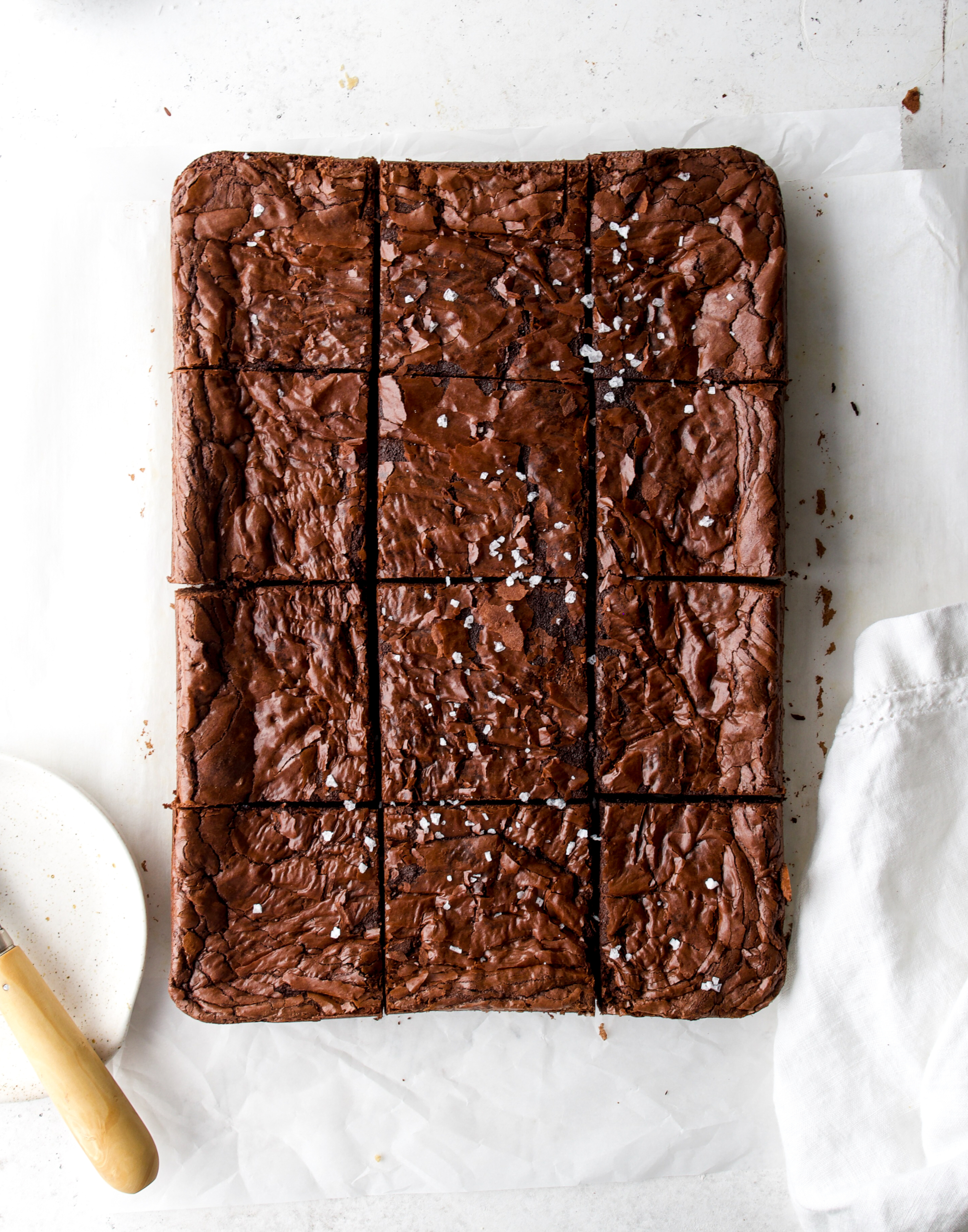 Brownies cut into 12 giant brownie slices.