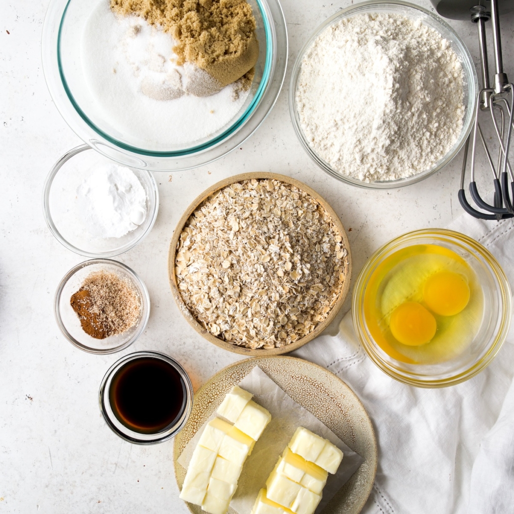 All of the ingredients that go into iced oatmeal cookies.