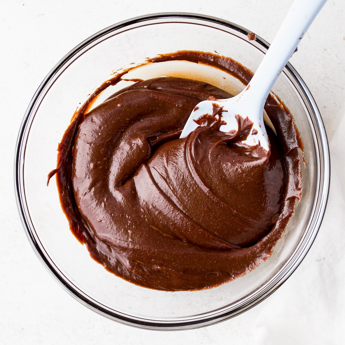 A glass bowl of homemade nutella. 